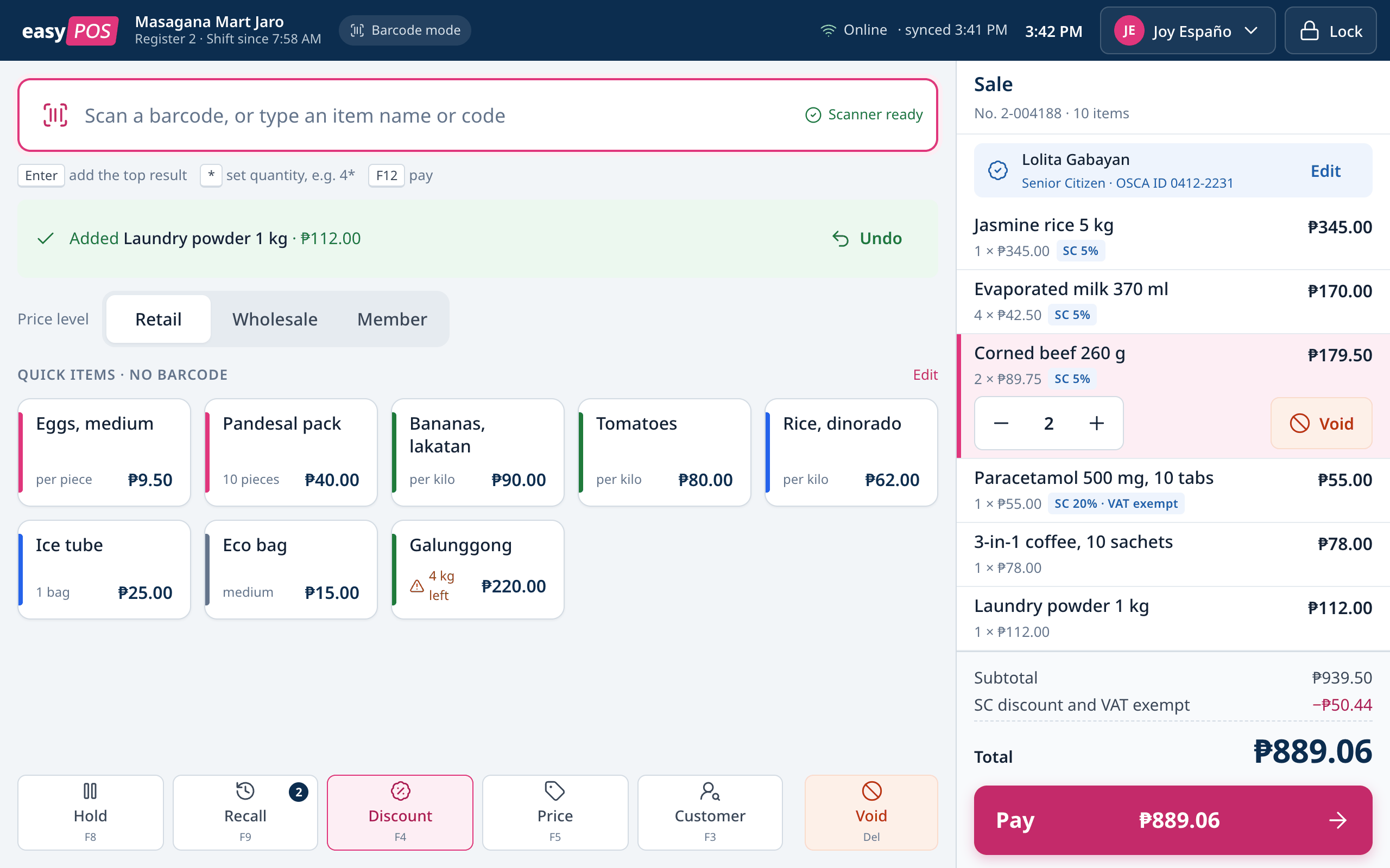 The easyPOS register in barcode mode: a scan field, an Added Laundry powder line with Undo, price levels, quick items, a function bar with Hold, Recall, Discount, Price, Customer and Void, and the cart on the right with a Senior Citizen customer, six lines and a total of ₱889.06 above the Pay button